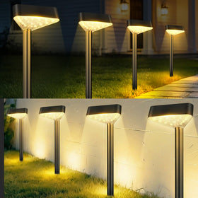 Fashlits 8-pack solar pathway lights cast a warm yard glow for safe walkways