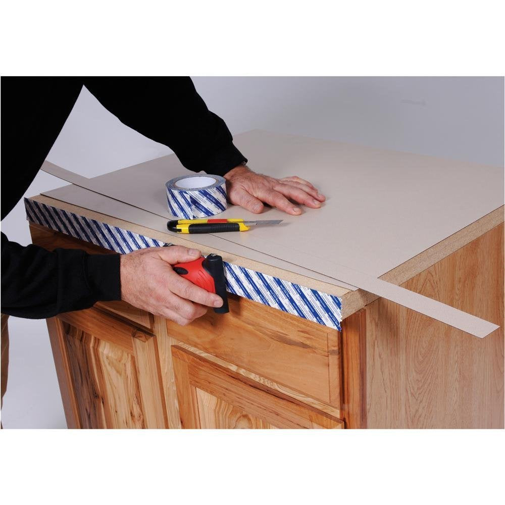 FastCap SpeedTape used on cabinet edge for durable laminate bonding