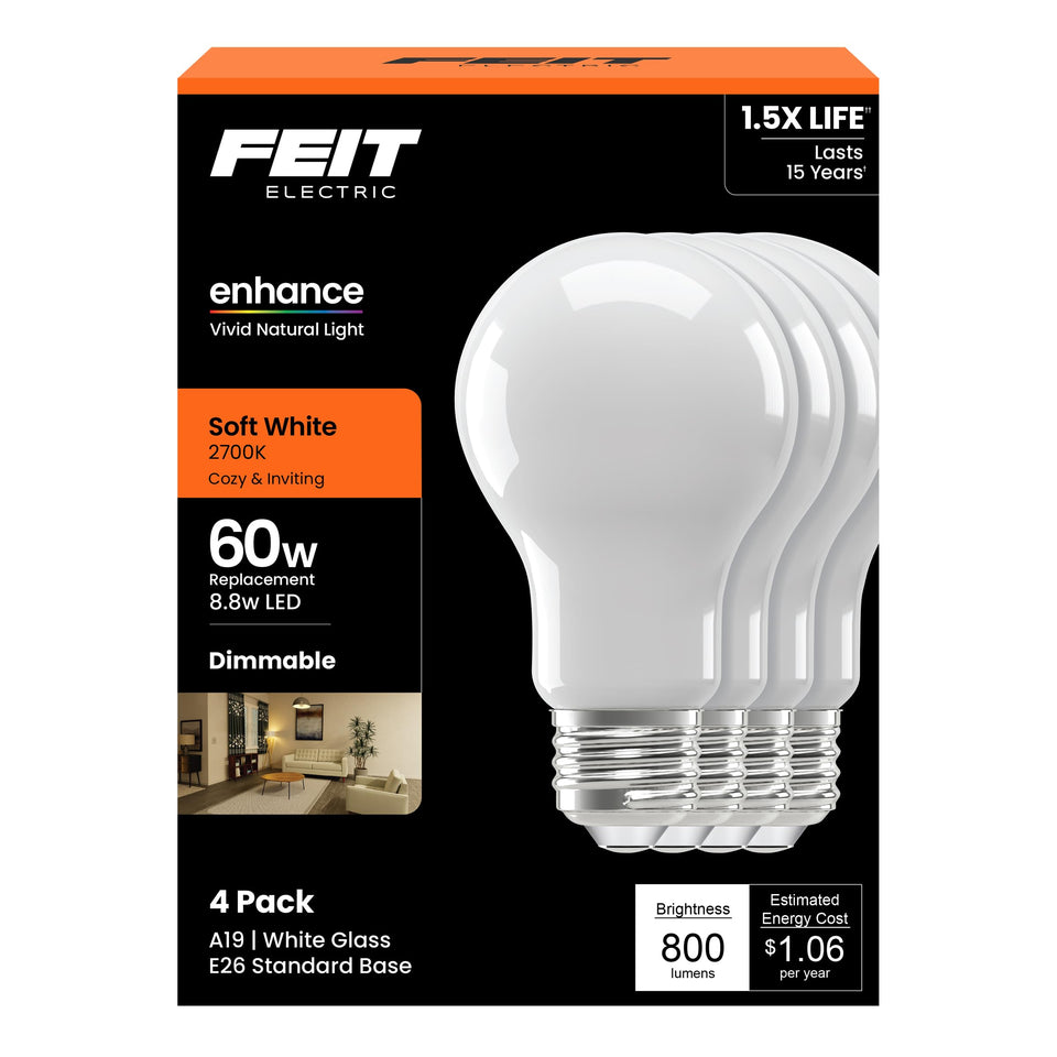 Feit Electric A19 Enhance filament bulb glows softly to create cozy living room ambiance.