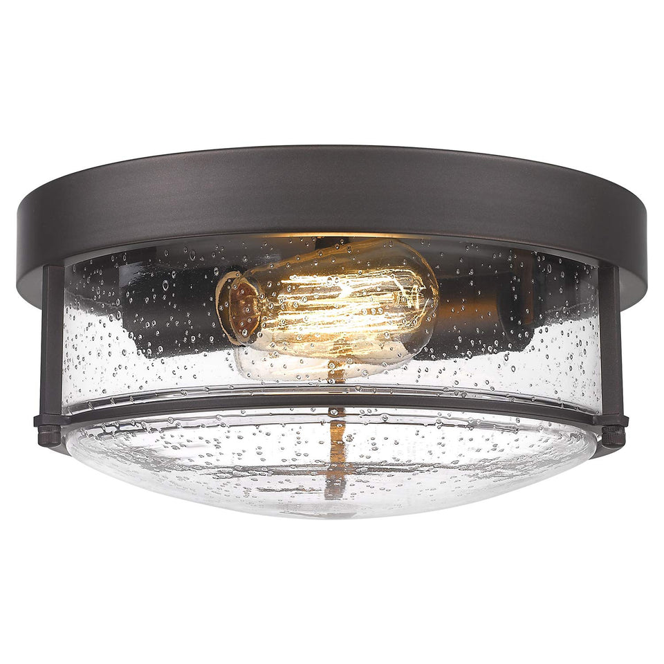 FEMILA flush mount light with seeded glass for warm kitchen ambiance.