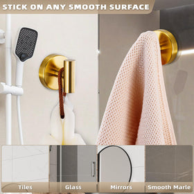 Brushed gold Fenas hook being installed on a smooth tile surface