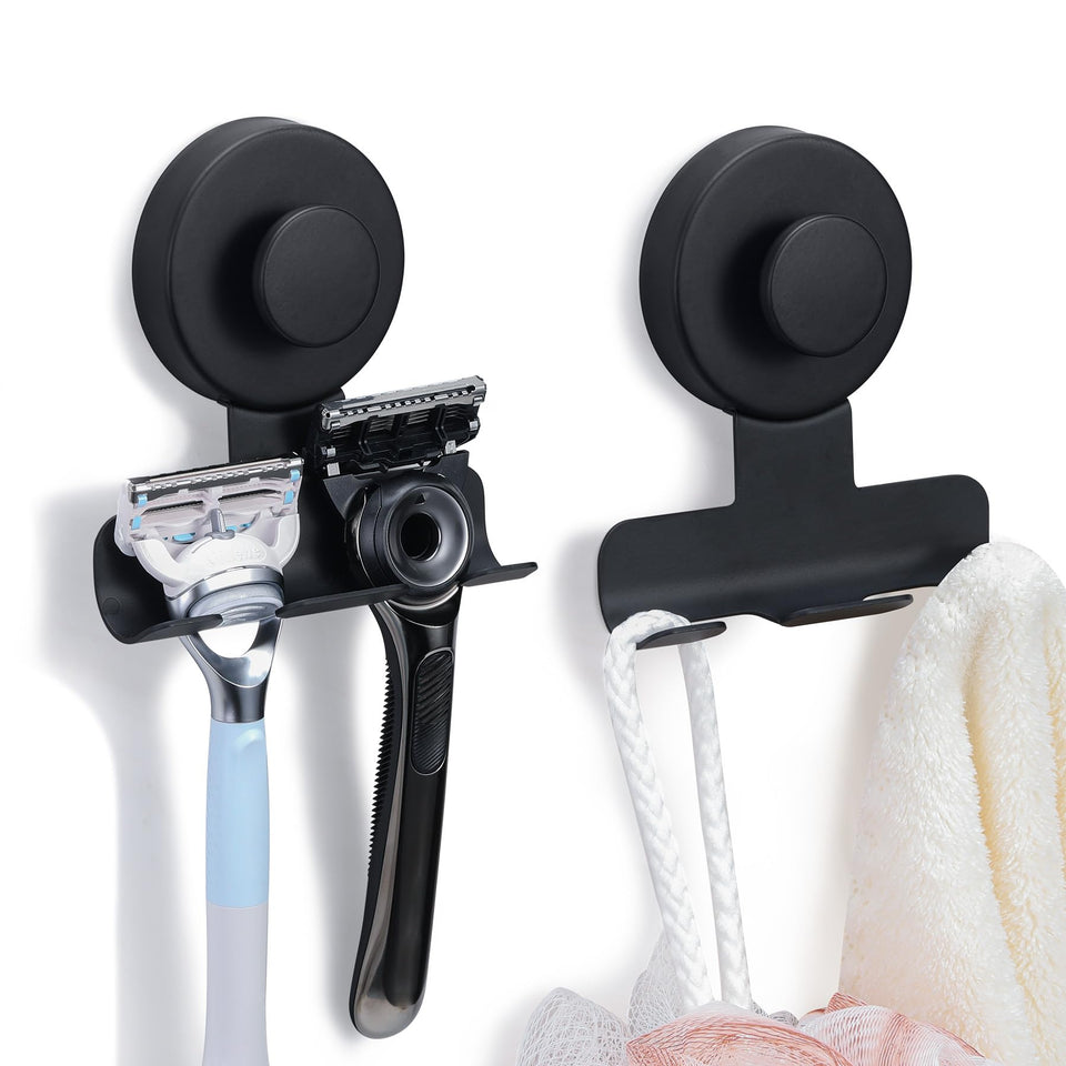 Fenas suction cup razor holder in matte black mounted on tile wall holds razors securely.