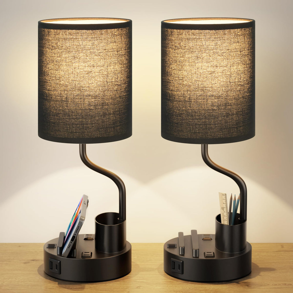 Fenmzee black bedside lamp with AC outlets for bedside device charging.