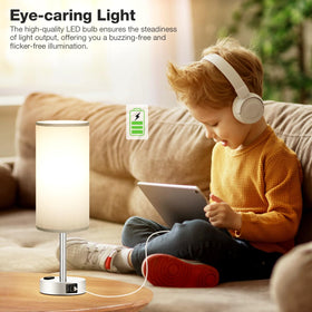 Fenmzee lamp on bedside table beside a reading setup for night use