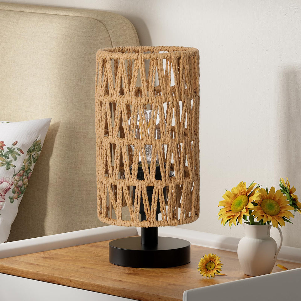 Fenmzee small table lamp with black base and rattan rope shade for cozy bedroom lighting.