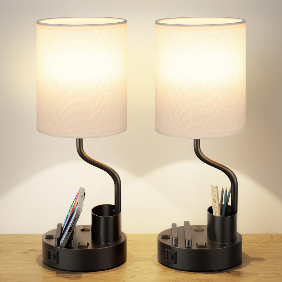Fenmzee white bedside lamp with two outlets and USBs for easy charging.