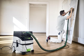 Festool CT MIDI I AutoClean shows self-guided maintenance for steady suction.