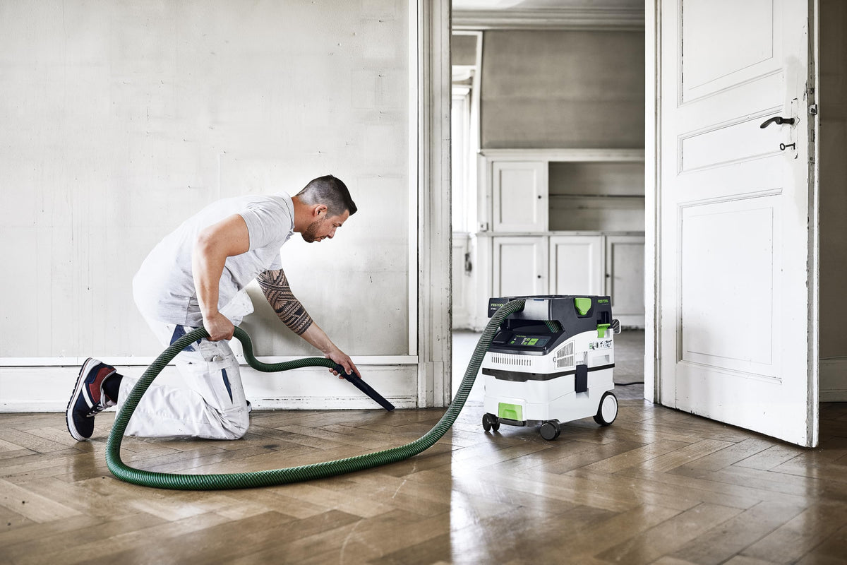 Festool CT MIDI I quick-filter-change highlights tool-free filter swap for minimal downtime.