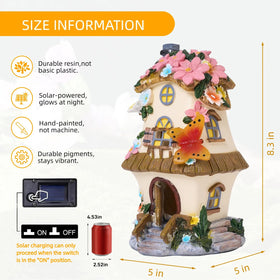 FHNQRQN resin fairy garden house shown on a sunny outdoor setting.