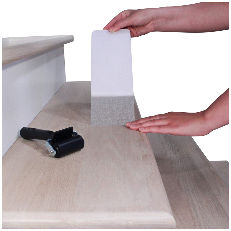 FINEHOUS 32x4 clear stair tread on wood stairs improves traction.