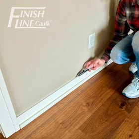 Finish Line Caulk compatible with latex, acrylic, grout, epoxy for versatile repairs.