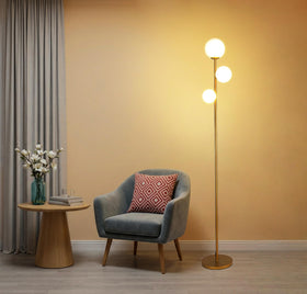 Fiqevs 3-globe floor lamp base in antique brass provides sturdy support for living spaces
