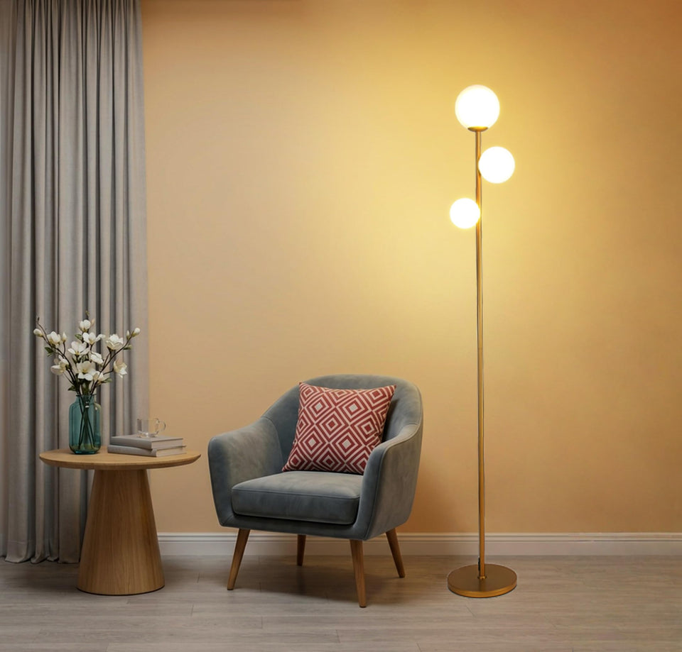 Fiqevs 3-globe floor lamp base in antique brass provides sturdy support for living spaces