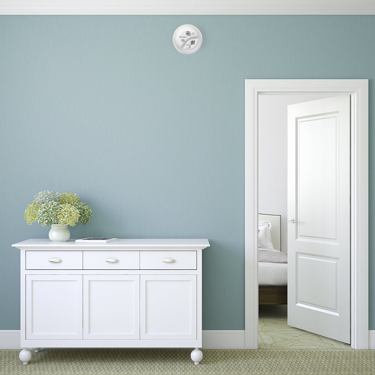 First Alert HD6135FB interconnectivity setup links with multiple alarms for cohesive alerts.