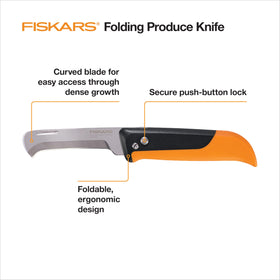 Fiskars folding knife with curved blade reaching dense growth for clean cuts