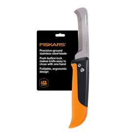Fiskars folding produce knife folded in hand for safe harvest