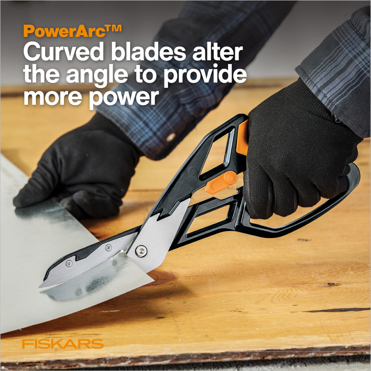 Fiskars PowerArc tin snips open-top loop in action for added leverage