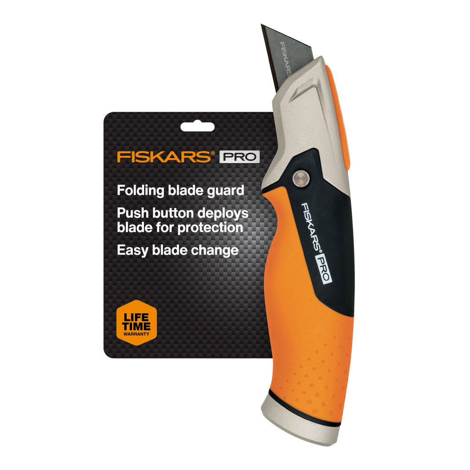 Fiskars Pro Fixed Knife with folding guard deployed for secure protection.