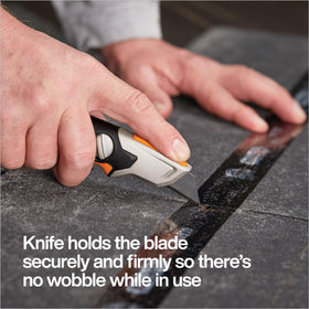Fiskars Pro Fixed Knife reinforced metal end for impact resistance.