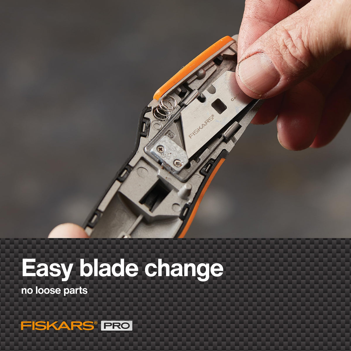 Fiskars Pro retractable knife storage area for blades on the body