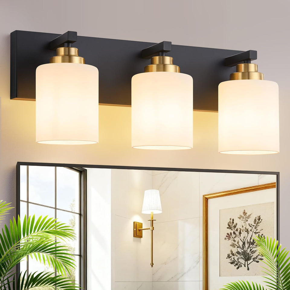 Fivesun vanity light with three black-gold milky glass shades over a mirror, diffused glow.