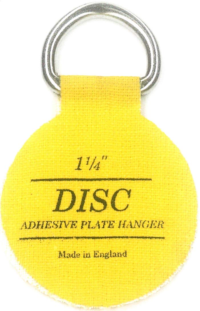 Flatirons Disc adhesive plate hangers in ready-to-wrap packaging, ideal for gifting