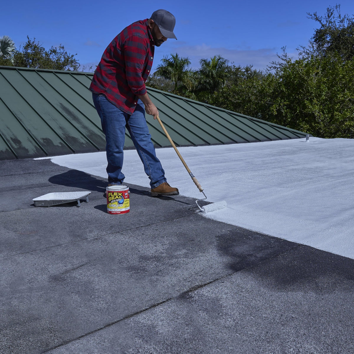 Flex Seal Liquid masonry coating sealing outdoor surfaces.
