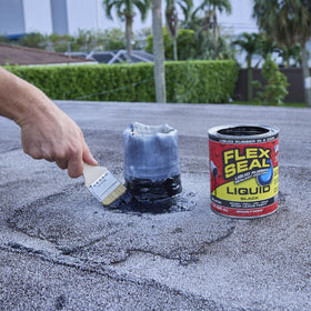Flex Seal Liquid poured for quick coating on surfaces