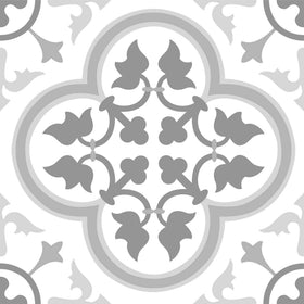 FloorPops Remy peel-and-stick tile in grey Gothic motif enhances a chic white backdrop.