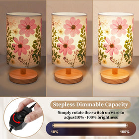 Floresita linen shade and wood base for warm bedside lighting.