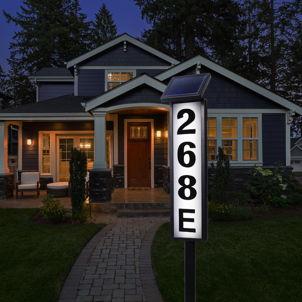 FLSEPAMB solar address sign lighted showing outdoor house numbers at night