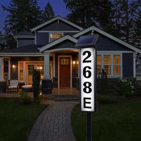 FLSEPAMB solar address sign lighted showing outdoor house numbers at night