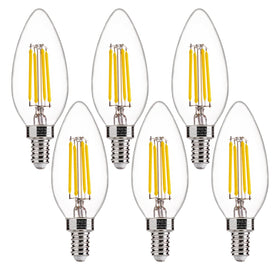 FLSNT 5000K daylight bulbs illuminate a chandelier with clear glass finish for bright ambiance.