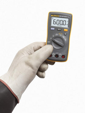 Fluke 107 display-on showing the backlit screen for clear readings in dim spaces.