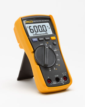 Fluke 115 multimeter backlit display enables reading in dim environments.