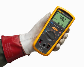 Fluke 1507 remote test probe in use for hard-to-reach insulation testing
