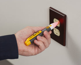 Fluke 2AC alert voltage tester tip glow indicates voltage presence safely.