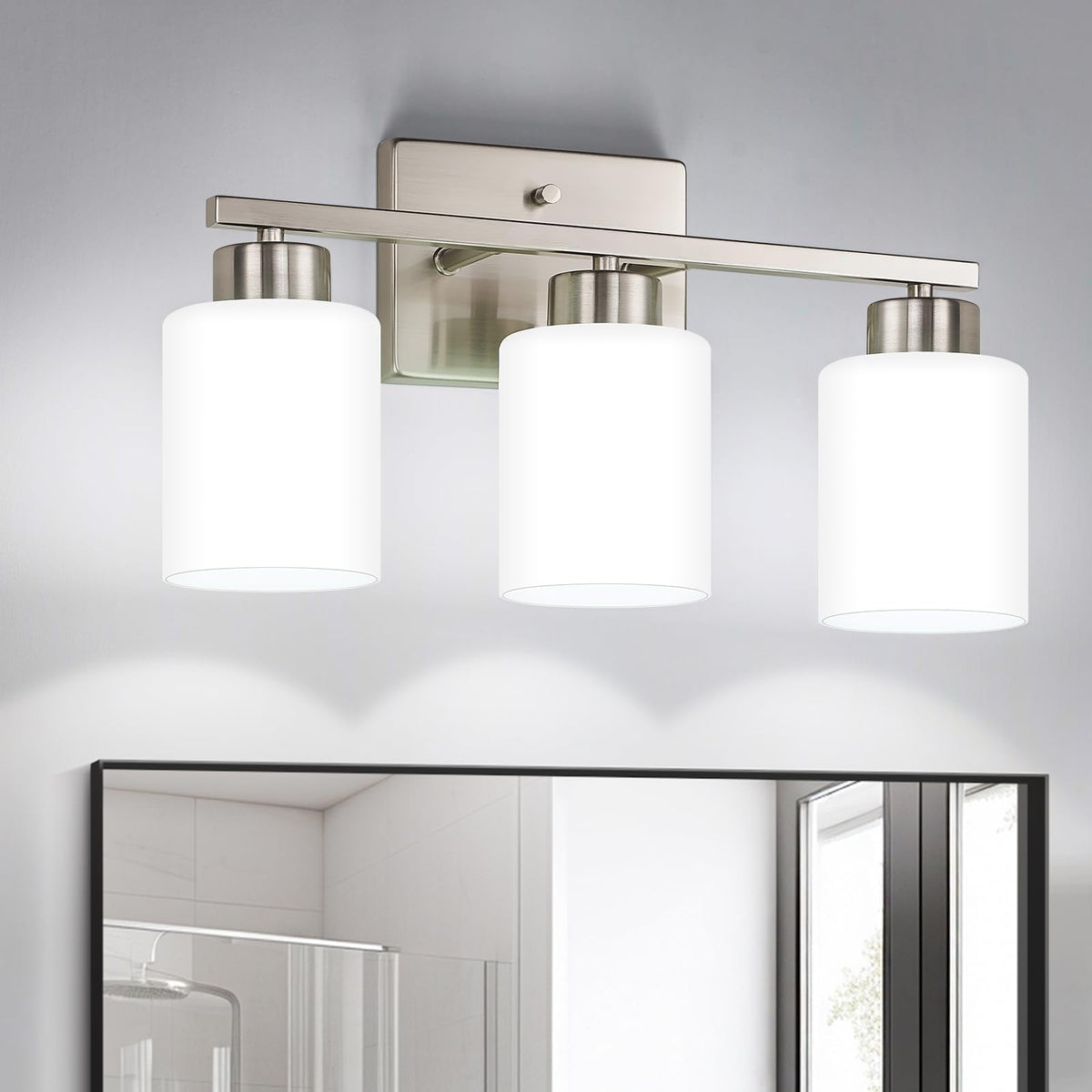 FonmYim vanity light with brushed nickel finish and glass shade for balanced vanity illumination.