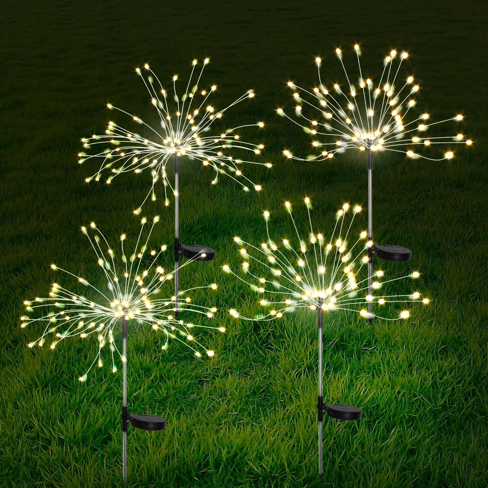 FOOING solar firework lights illuminate the garden setup with a warm ambient glow.