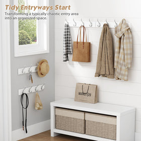 Forbena wall rack mounted in entryway with coats hanging