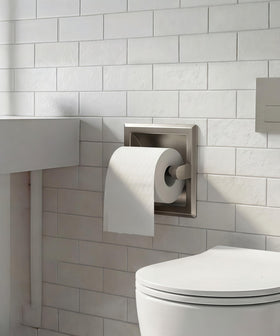 FORIOUS recessed toilet paper holder in brushed nickel, shown from the side view highlighting inset construction.