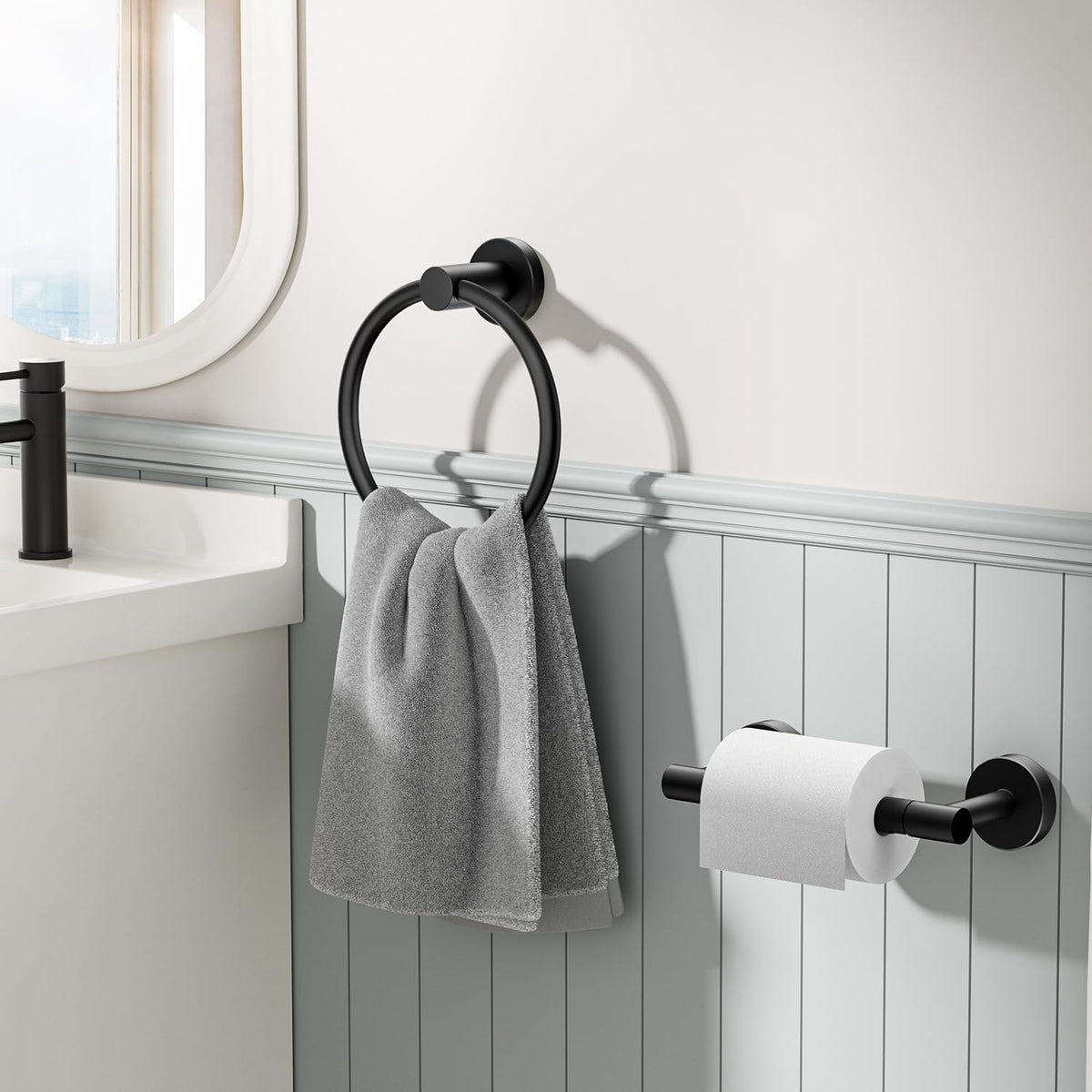 FORIOUS towel ring in matte black beside the holder for quick towel access.