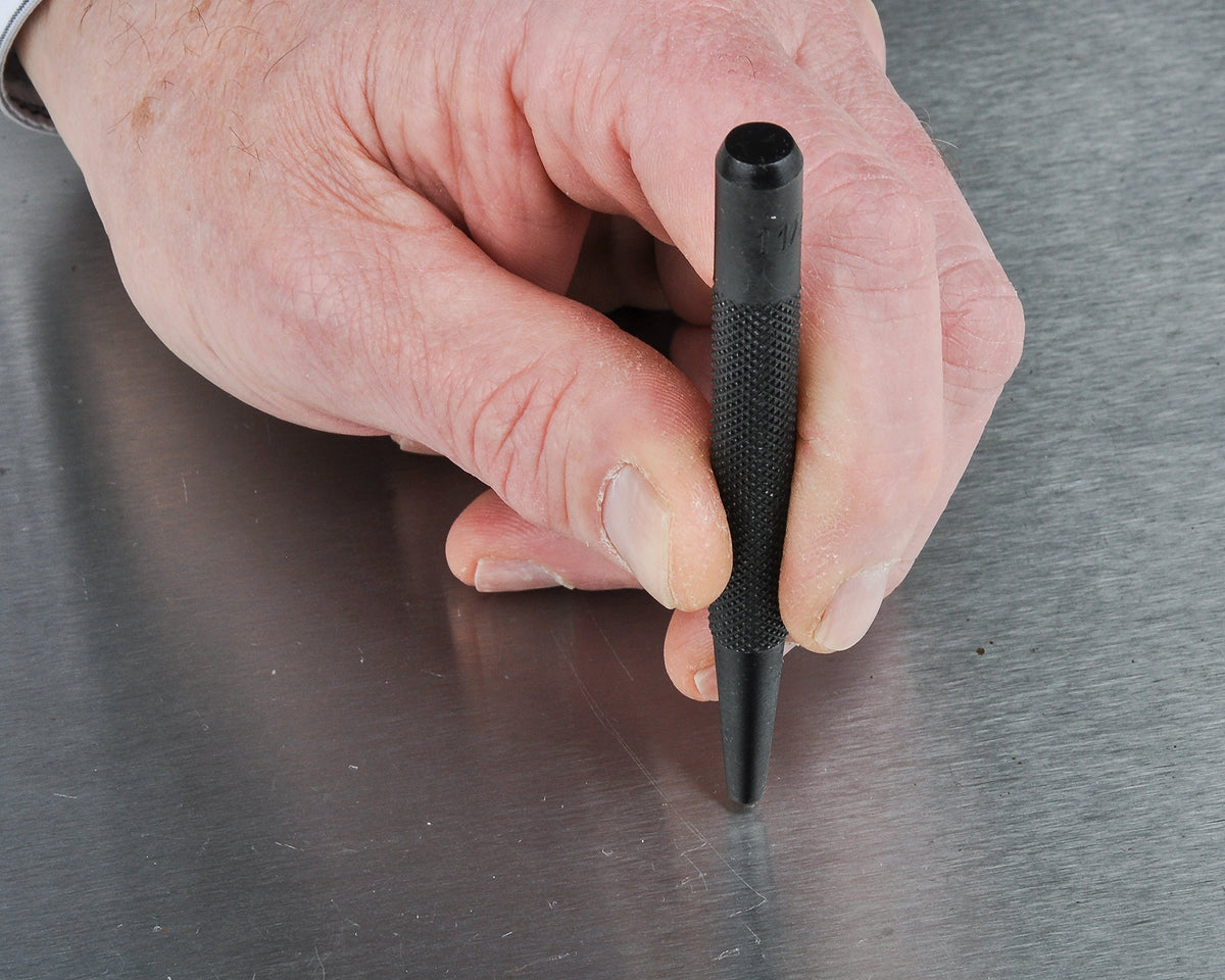 Fowler center punch set with knurled grip for secure handling.