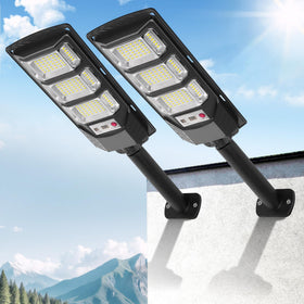 FOWSEEK solar street light 2-pack for outdoor driveways provides energy-efficient path lighting.