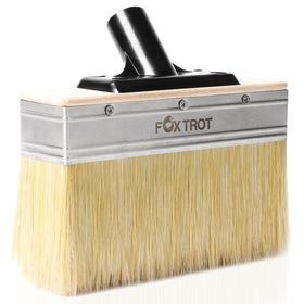 Fox Trot deck stain brush 7-inch in use for quick, even staining on wood