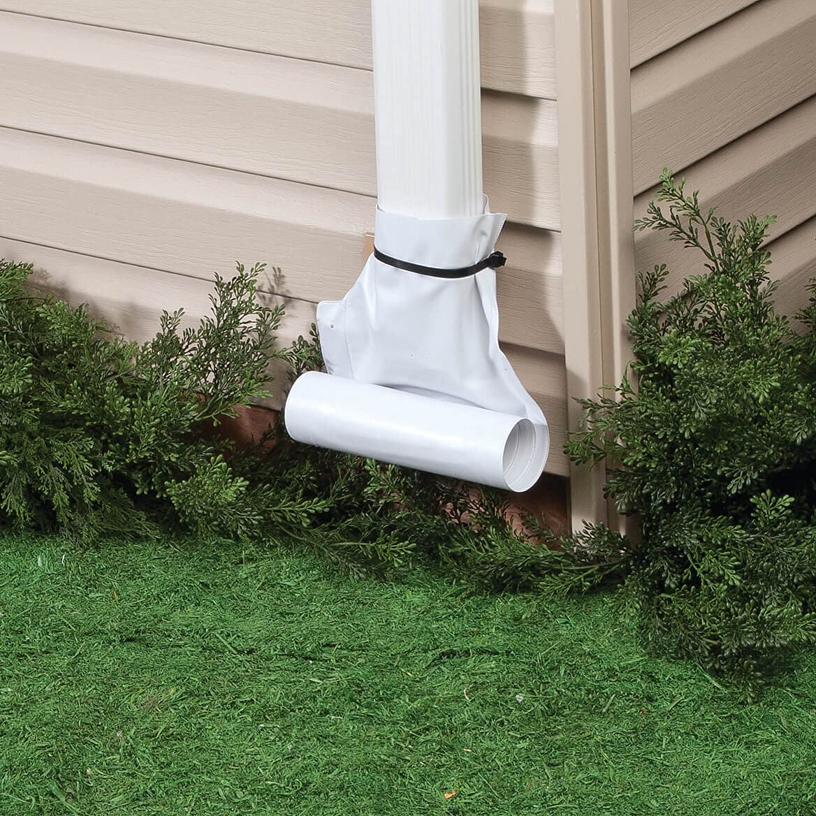 Fox Valley Traders weatherproof vinyl downspout extension stays durable in all seasons.