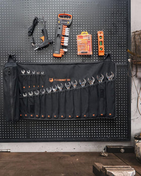 Foxrino Wrench Roll unrolled on wall for easy tool visibility.