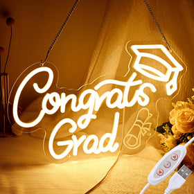 FRAMICS Congrats Grad Neon Sign mounted on wall for graduation photos