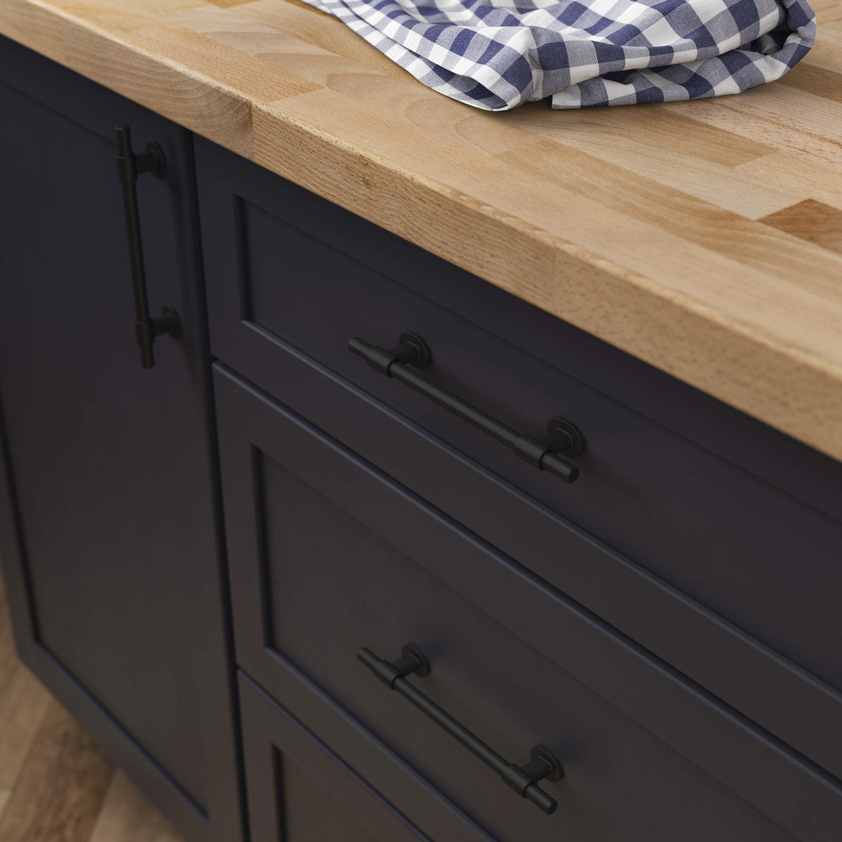 Close-up of matte black Adjusta-Pull showing adjustable spacing versatility