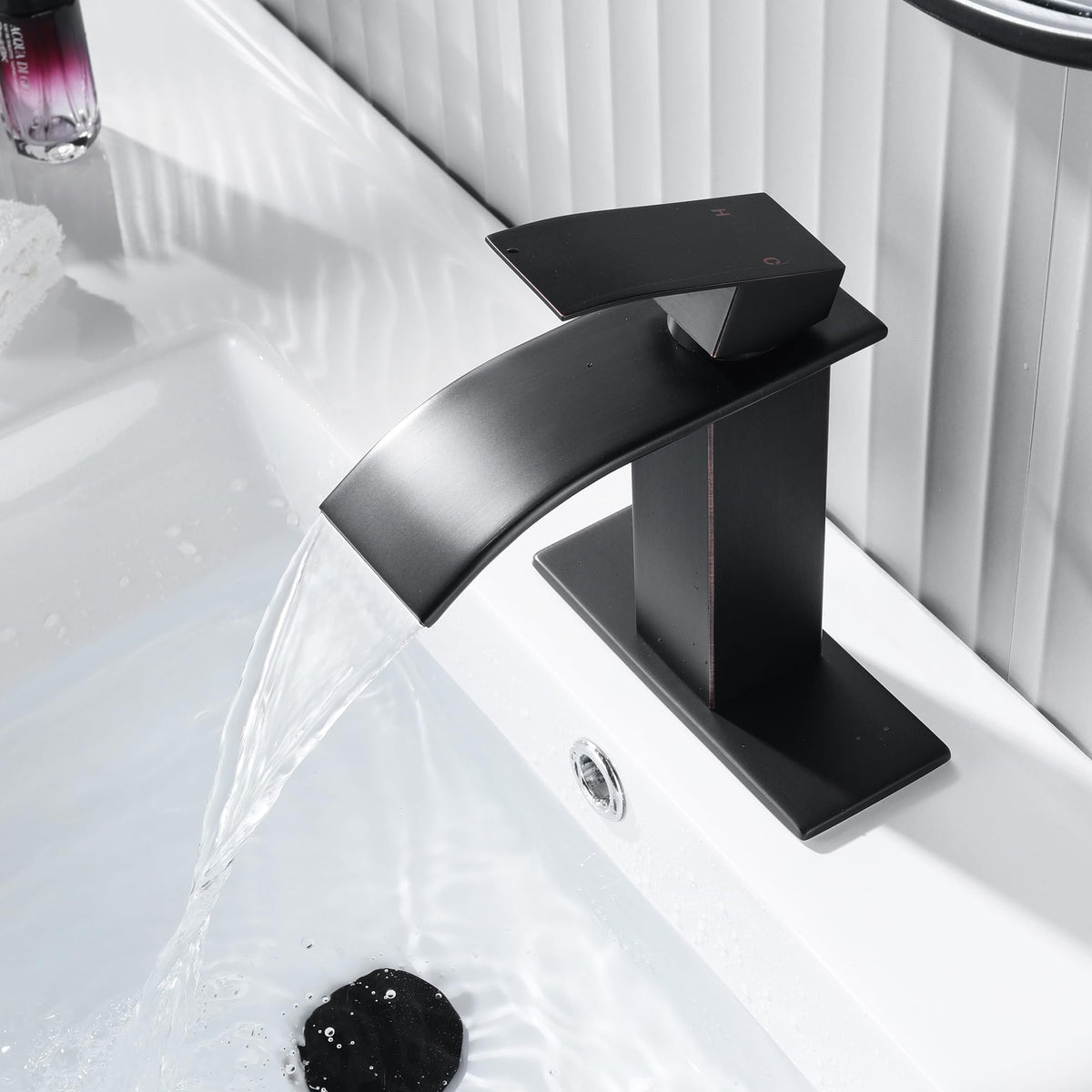 Fransiton waterfall faucet in three-hole deck for versatile bathroom remodeling projects